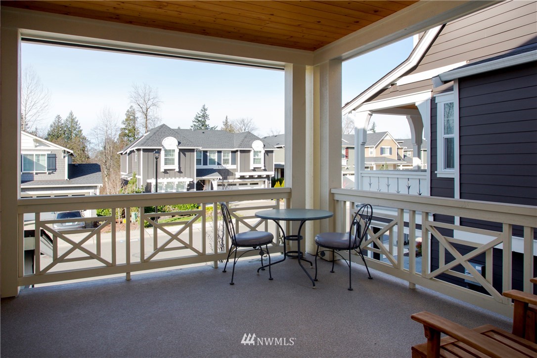 762 Lyons Avenue Northeast Renton, WA 98059 - Photo 9 of 33 a view of a chairs and table in a balcony