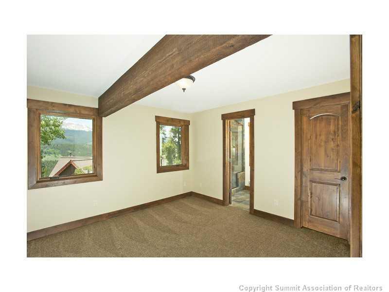 173 Co Road Breckenridge, CO 80424 - Photo 13 of 25 a room with a bed and a large window