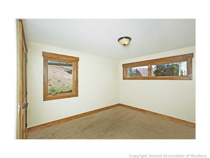 173 Co Road Breckenridge, CO 80424 - Photo 8 of 25 a room with a window and painting on the wall