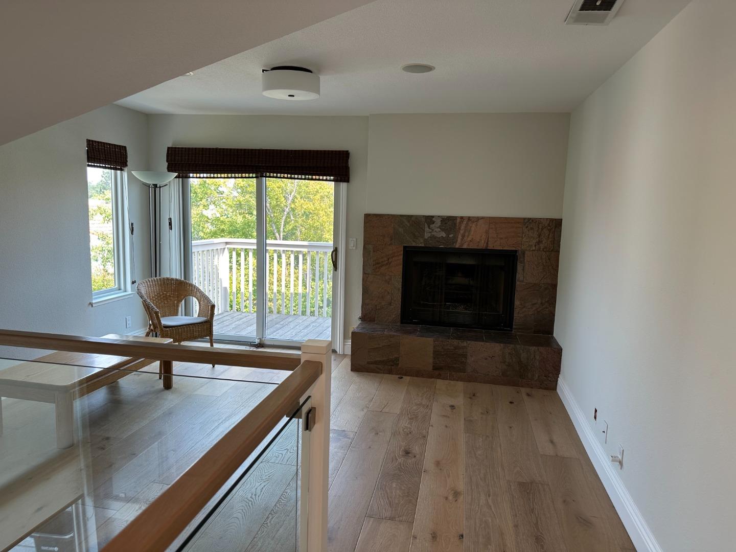 145 Calle Larga Los Gatos, CA 95032 - Photo 15 of 26 a living room with furniture and a fireplace