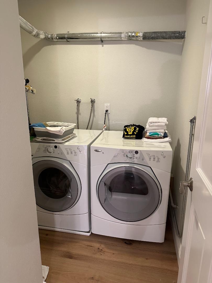 145 Calle Larga Los Gatos, CA 95032 - Photo 16 of 26 a utility room with dryer and washer