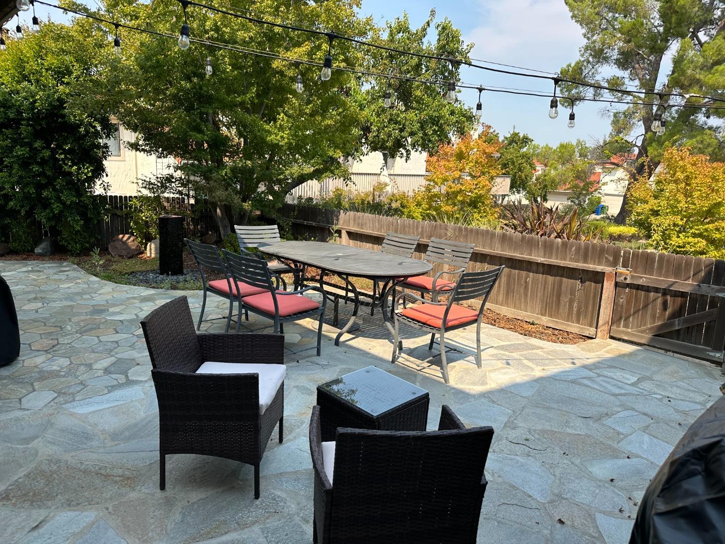 145 Calle Larga Los Gatos, CA 95032 - Photo 19 of 26 a view of a chairs and table in patio