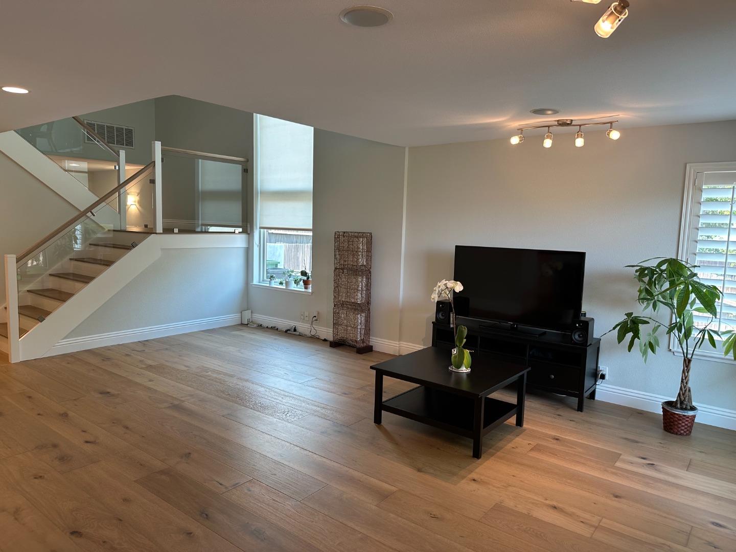 145 Calle Larga Los Gatos, CA 95032 - Photo 3 of 26 a living room with furniture and a flat screen tv