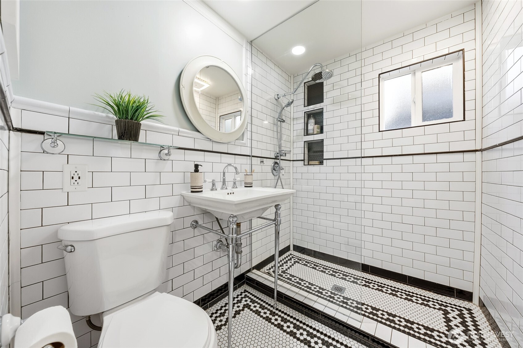 527 Avenue B Snohomish, WA 98290 - Photo 24 of 37 a bathroom with a toilet a sink and mirror