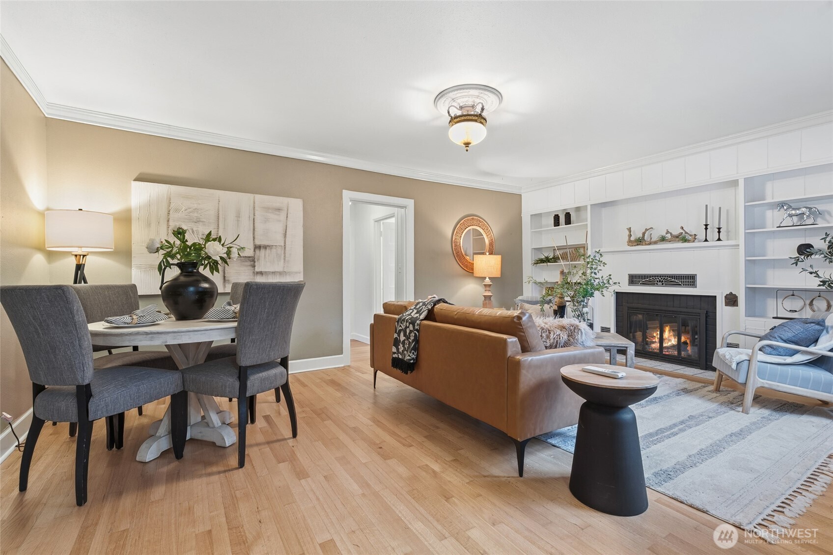 527 Avenue B Snohomish, WA 98290 - Photo 5 of 37 a living room with furniture a fireplace and a table