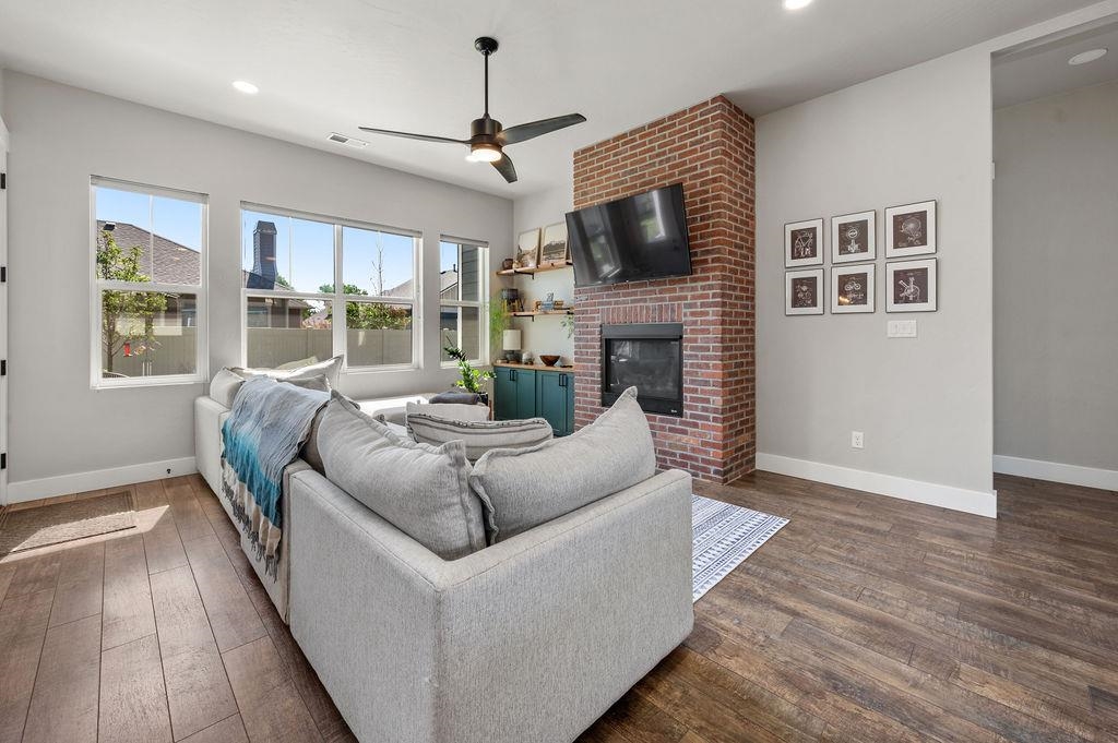 814 Red Apple Road Grand Junction, CO 81505 - Photo 2 of 23 a living room with furniture and a fireplace