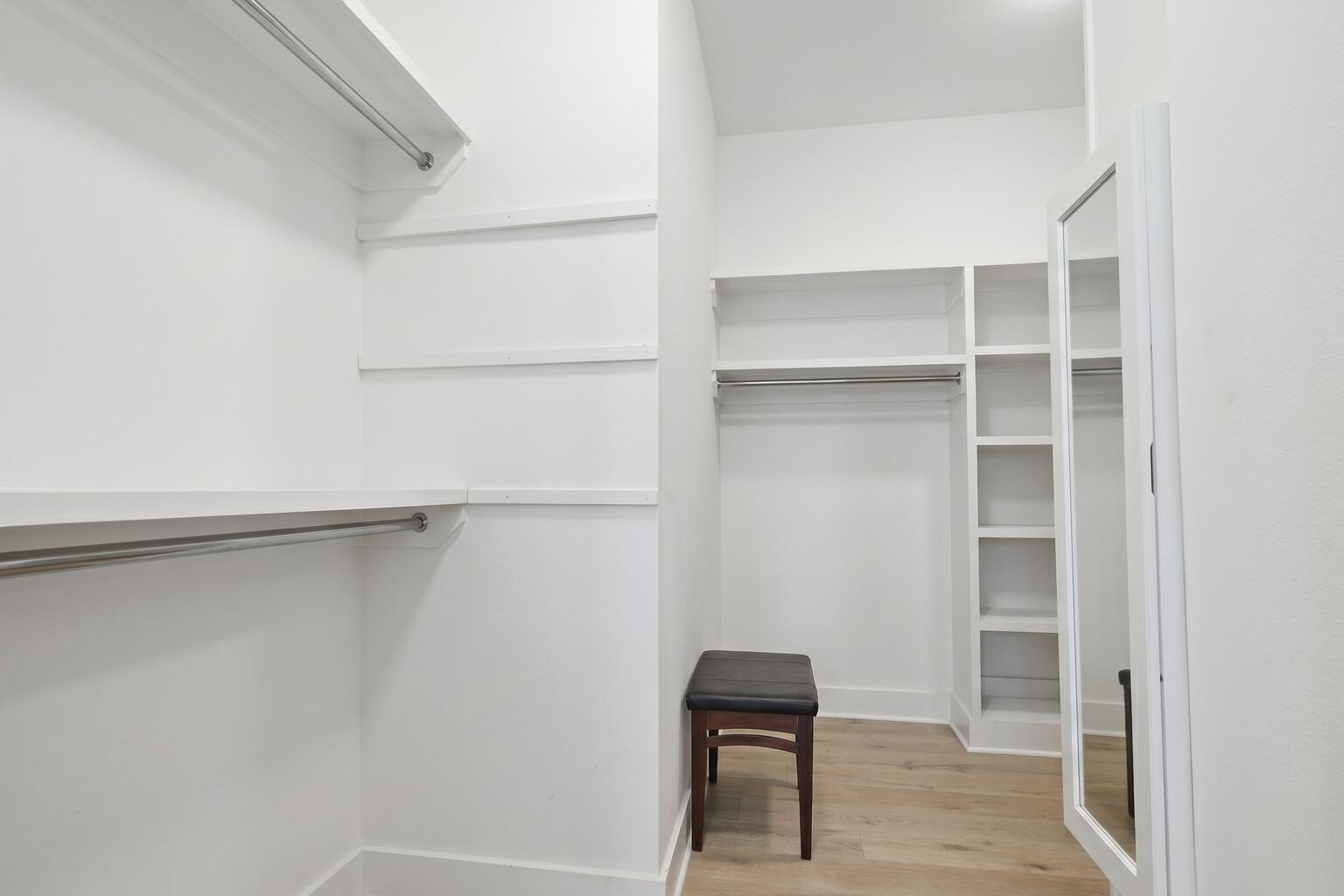 133 Sandchase Circle, Unit LOT 15 Inlet Beach, FL 32461 - Photo 18 of 47 a view of walk in closet with empty racks