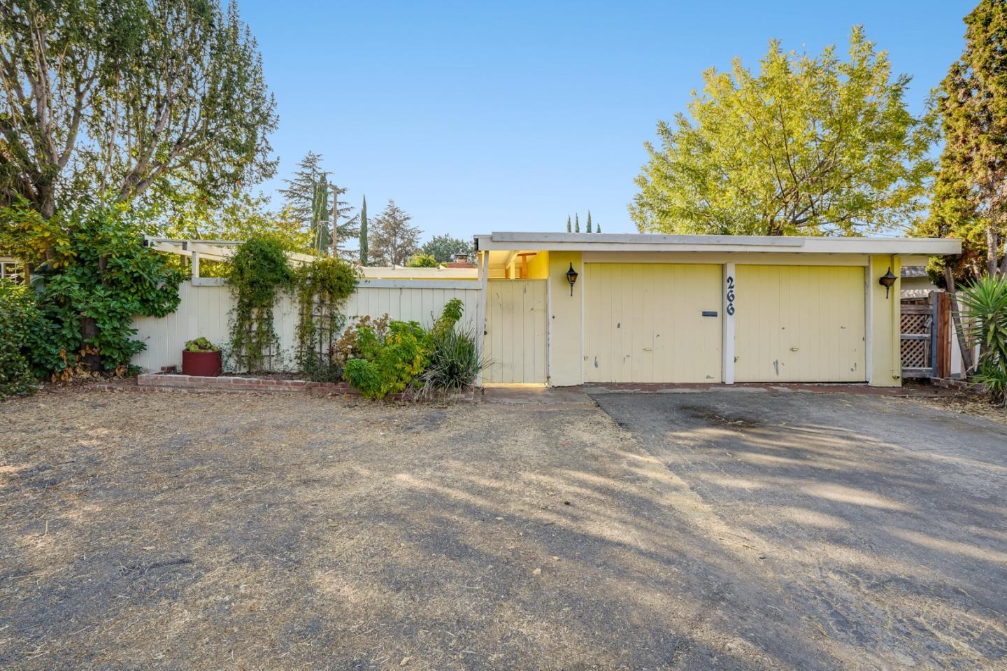 a view of garage and deck