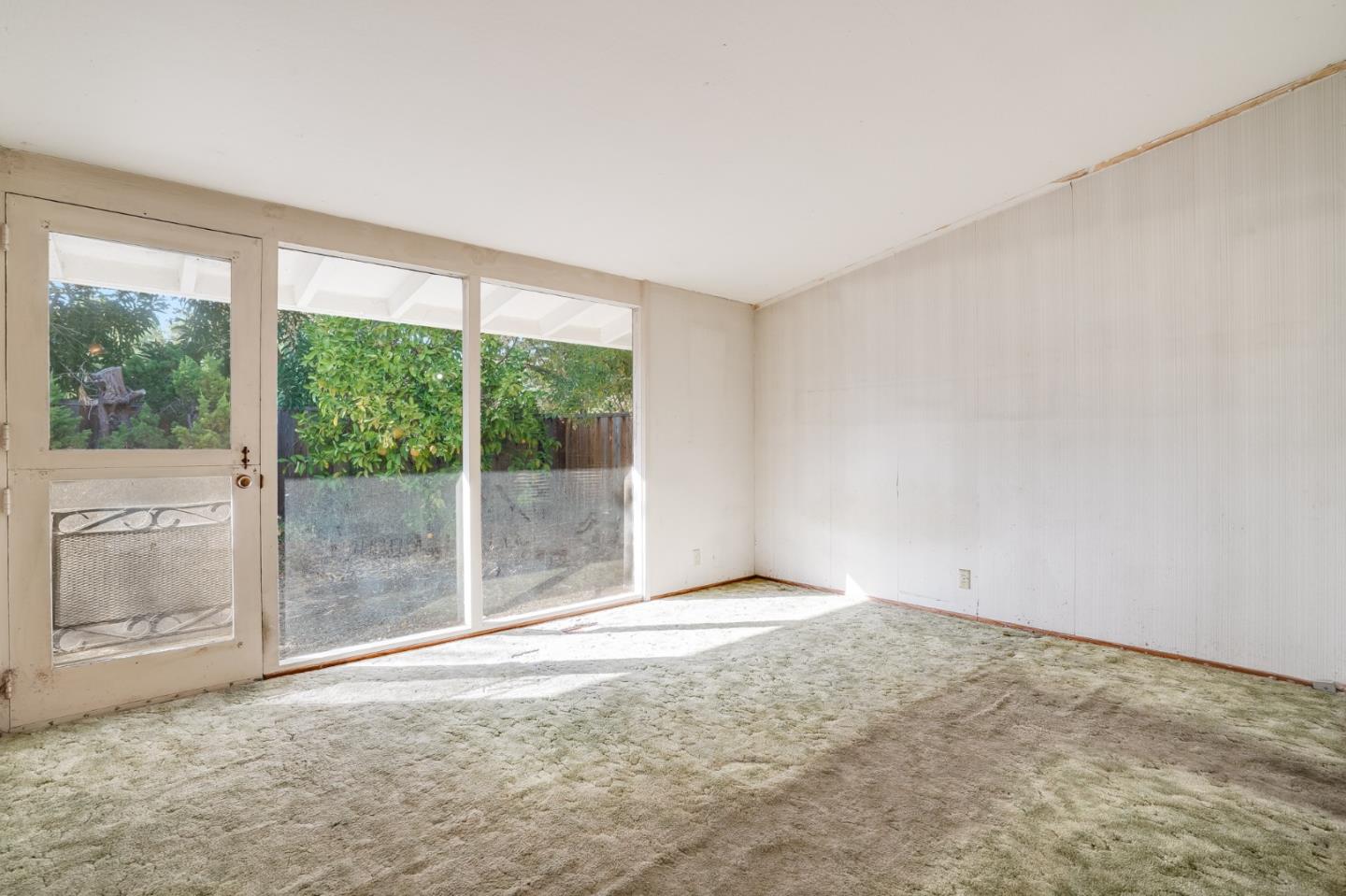 266 Thompson Avenue Mountain View, CA 94043 - Photo 13 of 25 a view of an empty room with a window