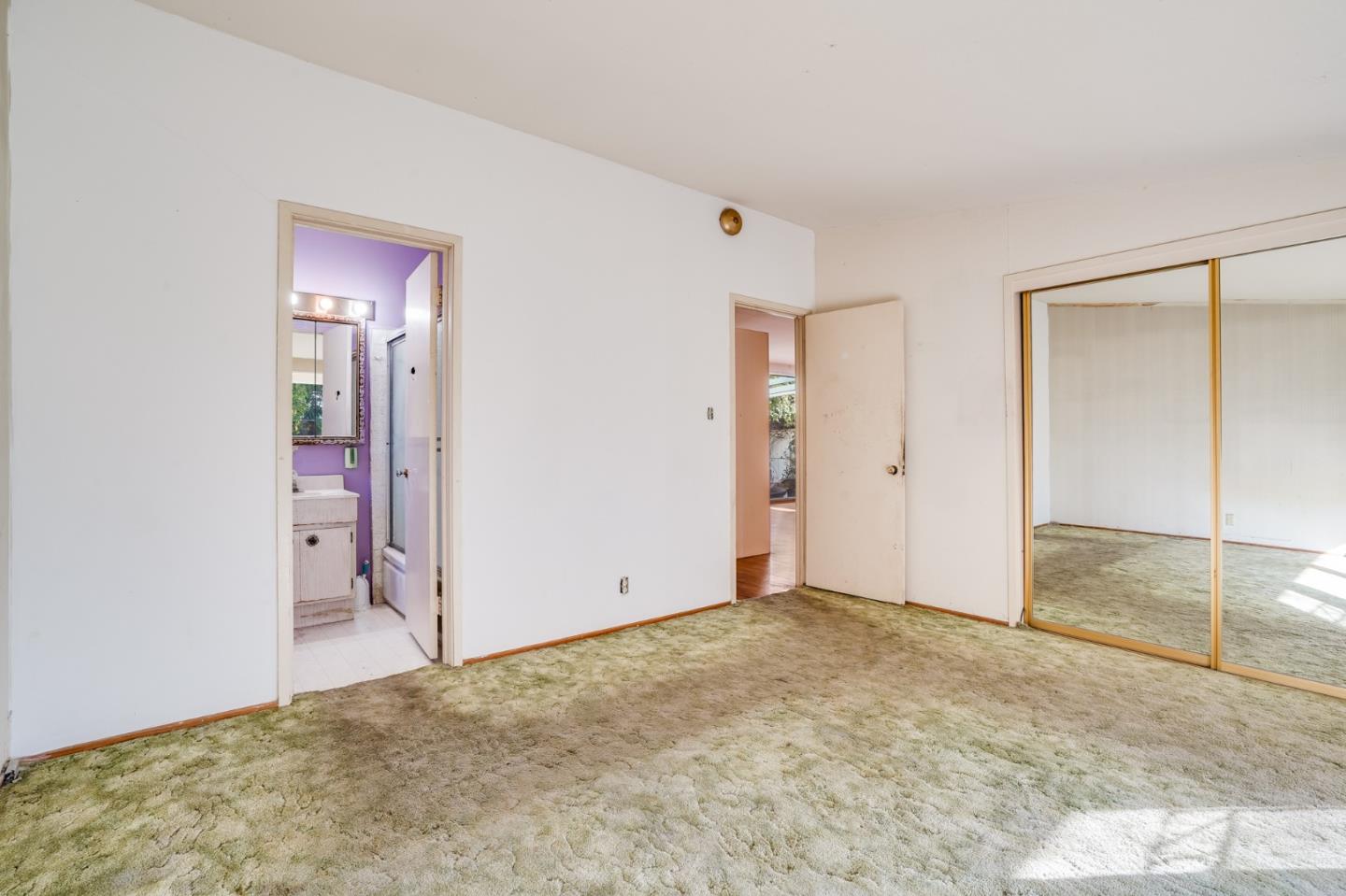 266 Thompson Avenue Mountain View, CA 94043 - Photo 14 of 25 an empty room with closet area