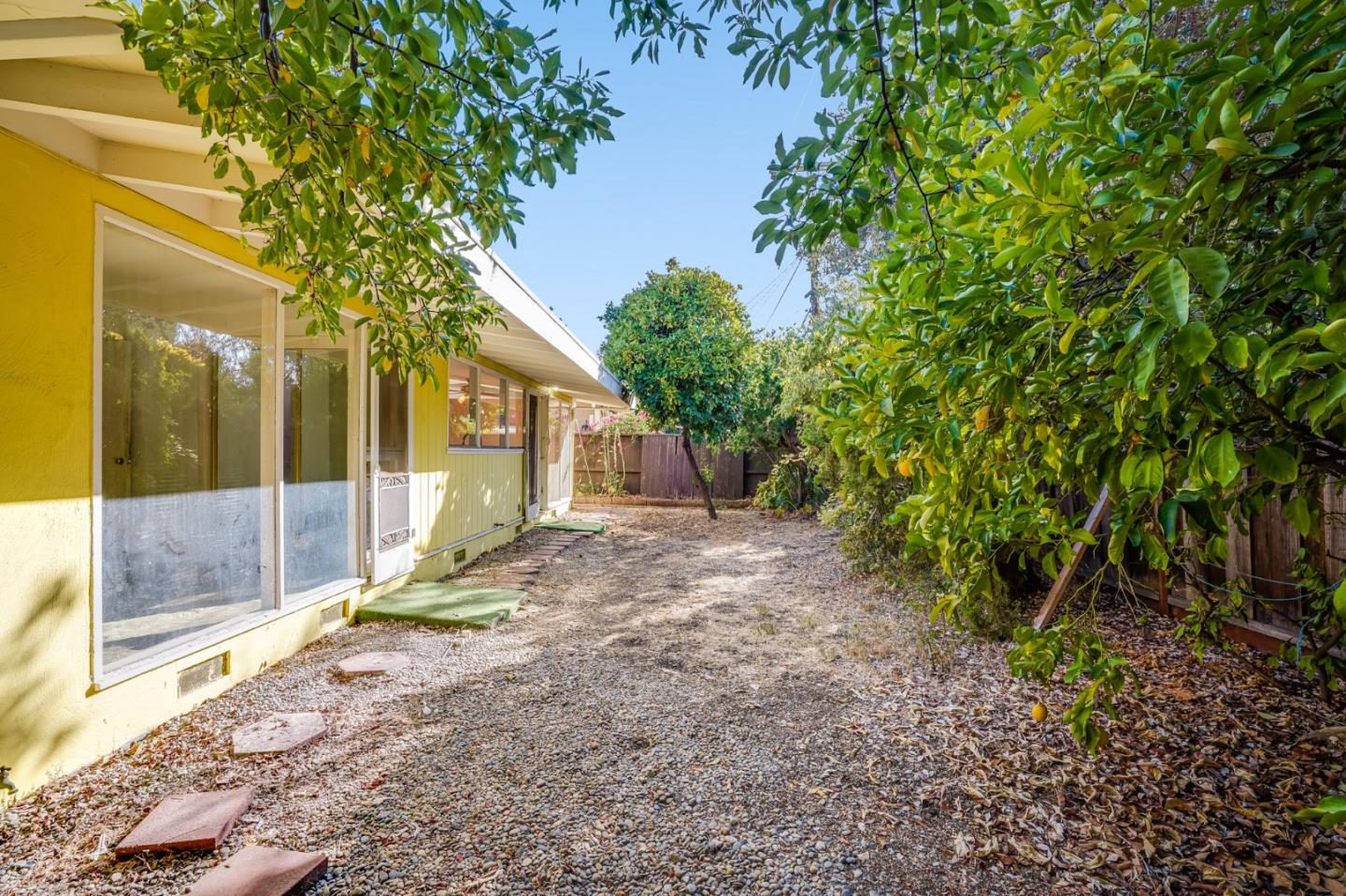 266 Thompson Avenue Mountain View, CA 94043 - Photo 22 of 25 a view of a house with backyard and tree