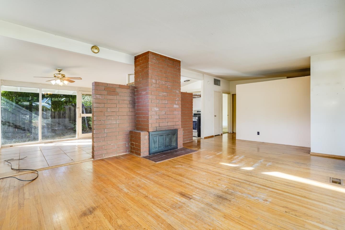266 Thompson Avenue Mountain View, CA 94043 - Photo 8 of 25 a view of an empty room with glass door