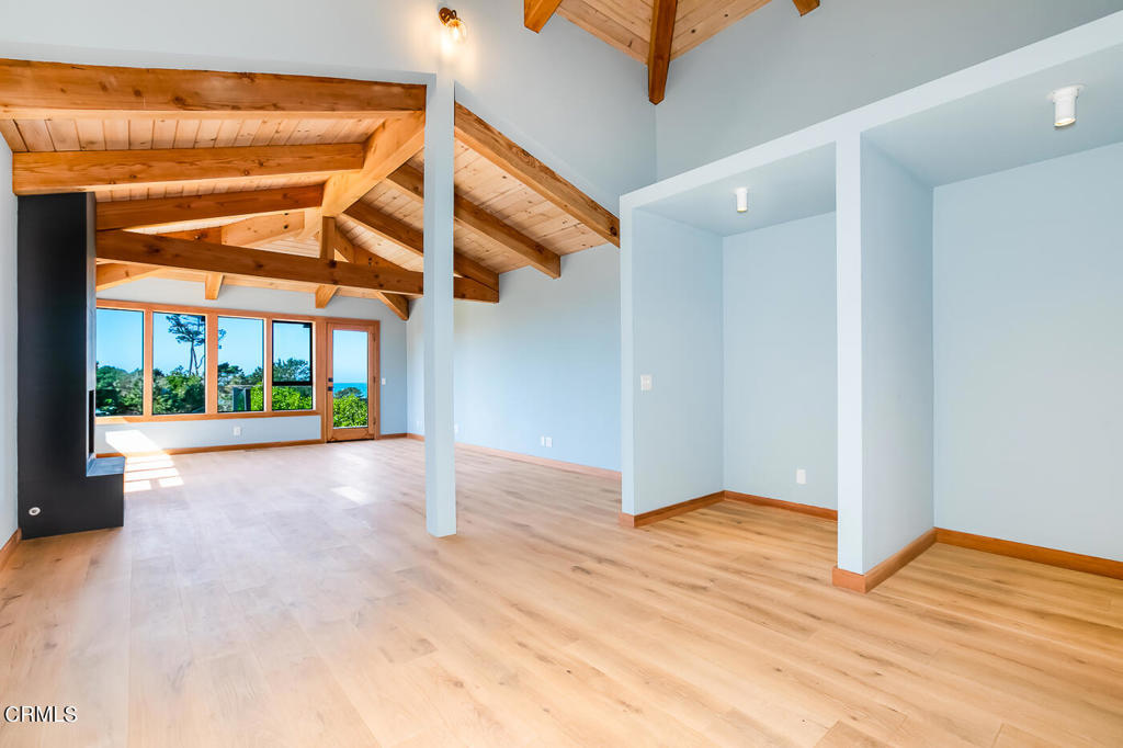 45460 Indian Shoals Road Mendocino, CA 95460 - Photo 19 of 50 a view of a room with wooden floor and window