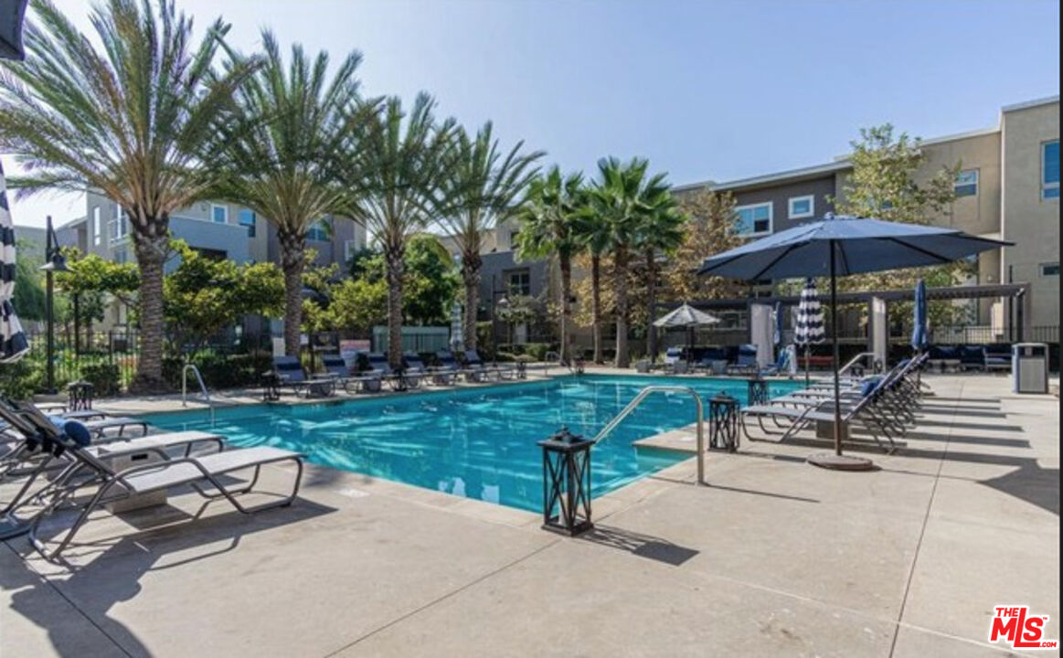 552 East Carson Street, Unit 408 Carson, CA 90745 - Photo 49 of 63 a view of a backyard with sitting area