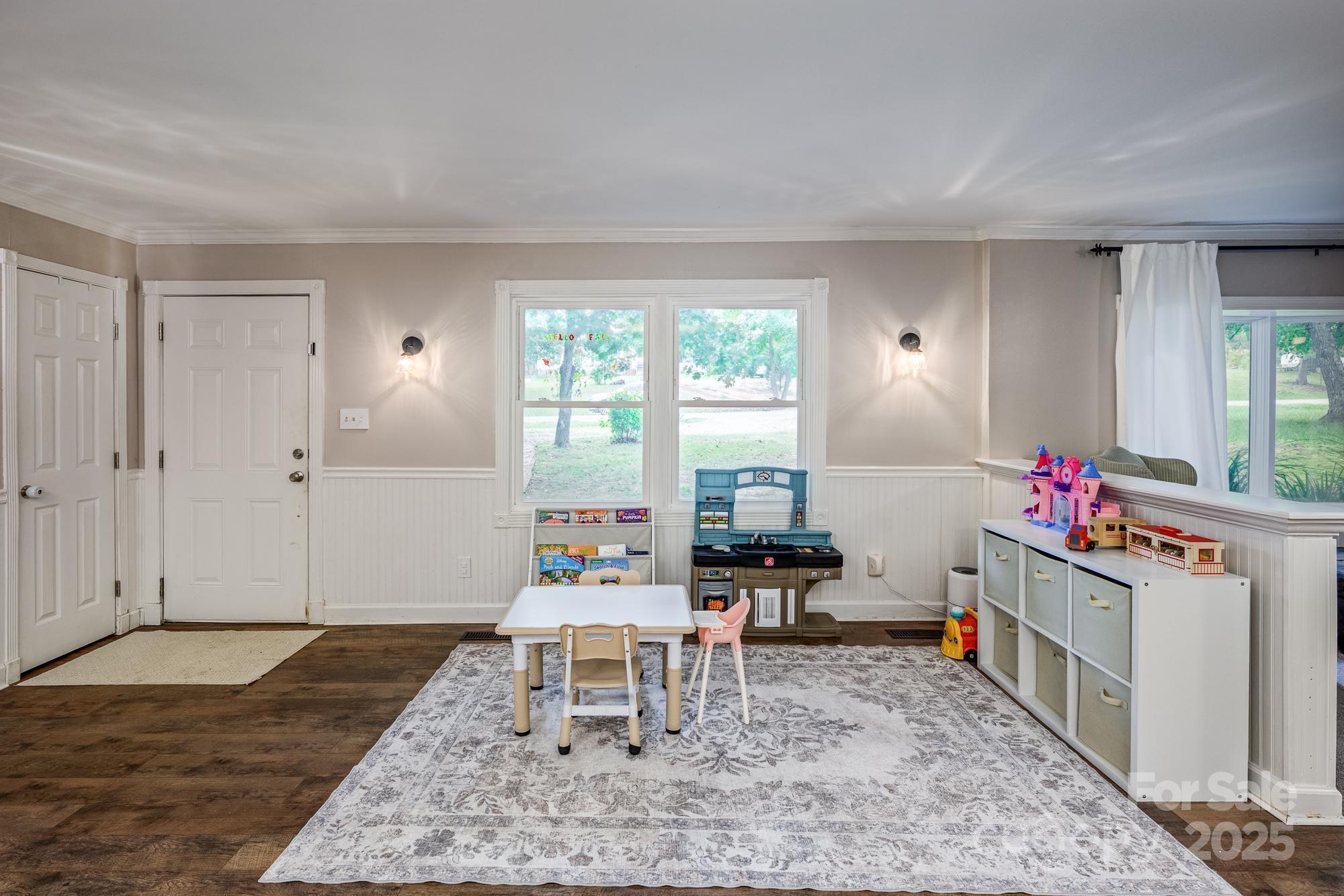 550 Brumley Road Mooresville, NC 28115 - Photo 13 of 35 a living room with furniture and a table