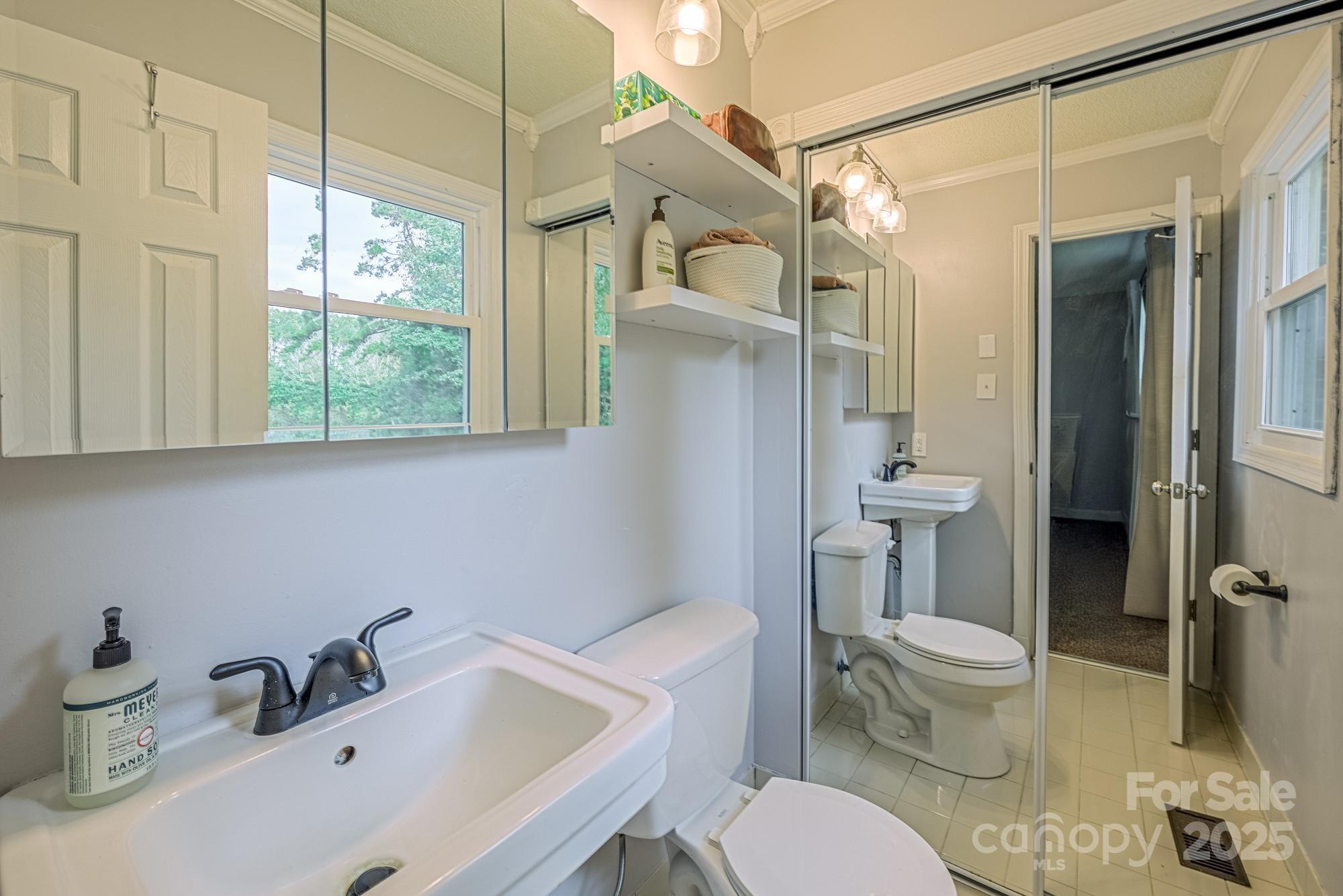 550 Brumley Road Mooresville, NC 28115 - Photo 23 of 35 a bathroom with a sink toilet and shower