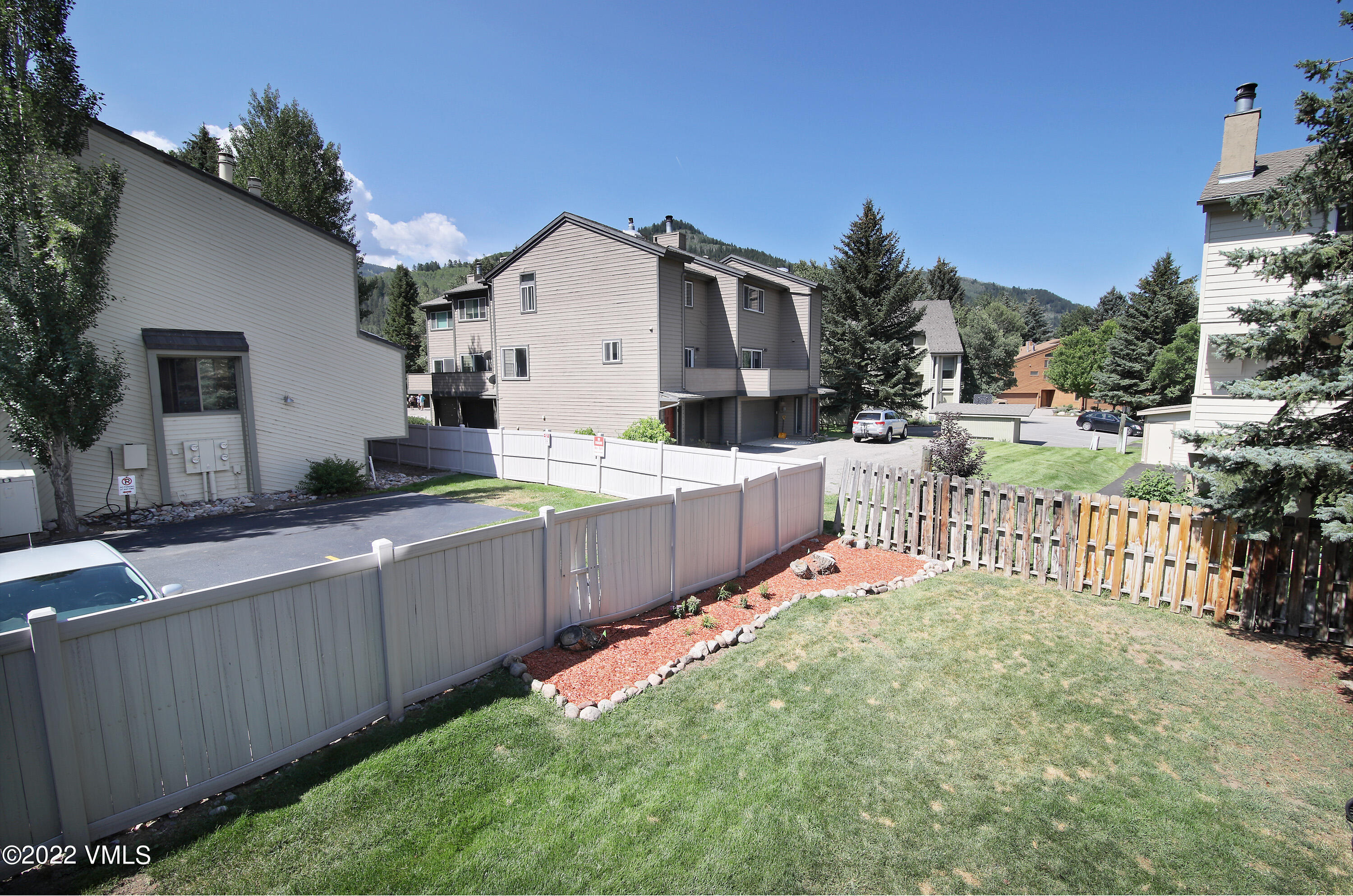 346 Eagle Road, Unit 2 Avon, CO 81620 - Photo 16 of 25 a view of a house with backyard and sitting area