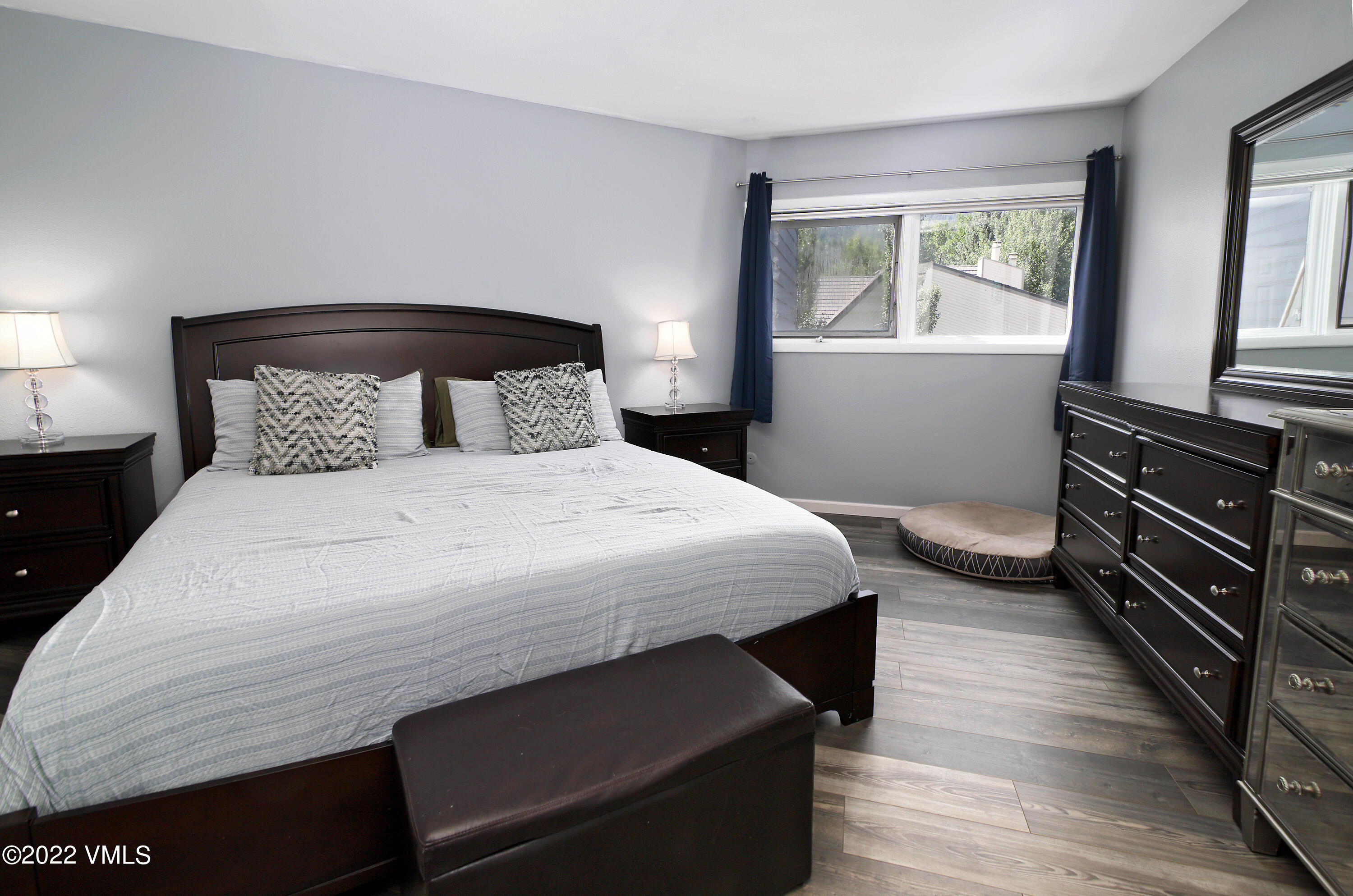 346 Eagle Road, Unit 2 Avon, CO 81620 - Photo 8 of 25 a bedroom with a bed and a window