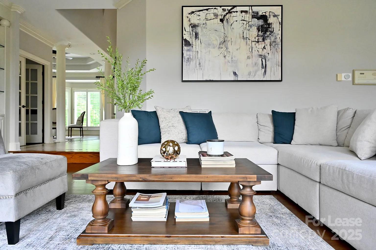 17234 Jetton Road Cornelius, NC 28031 - Photo 12 of 32 a living room with furniture and wooden floor