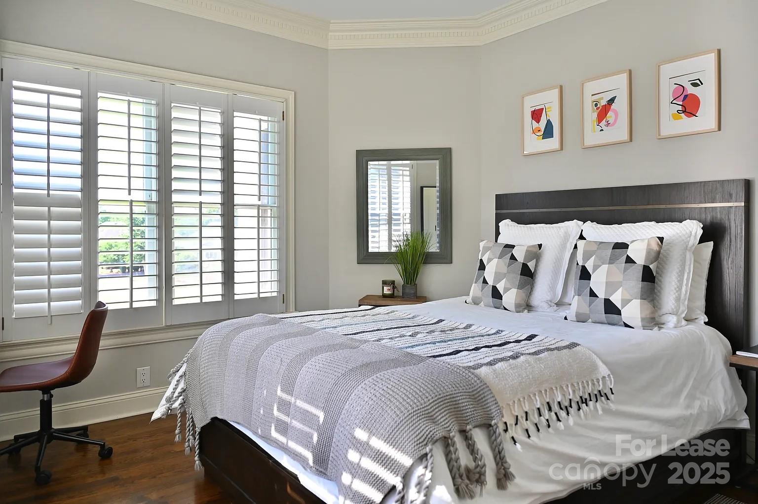 17234 Jetton Road Cornelius, NC 28031 - Photo 28 of 32 a bedroom with a bed and a window