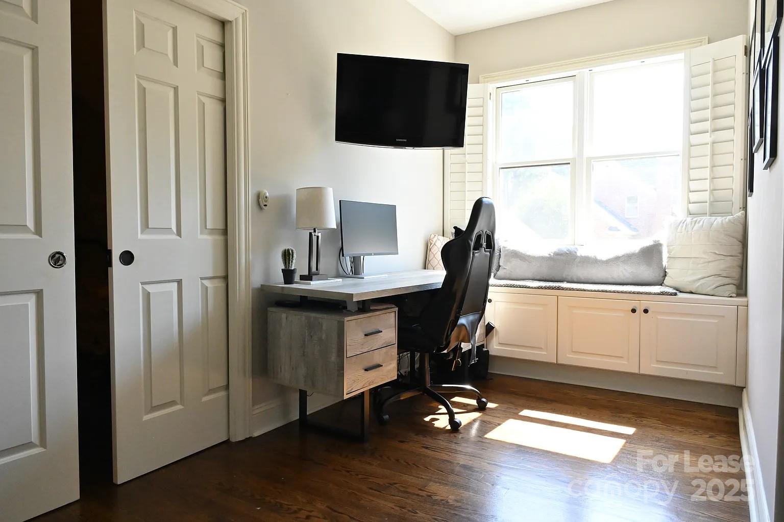 17234 Jetton Road Cornelius, NC 28031 - Photo 30 of 32 a view of workspace with wooden floor windows