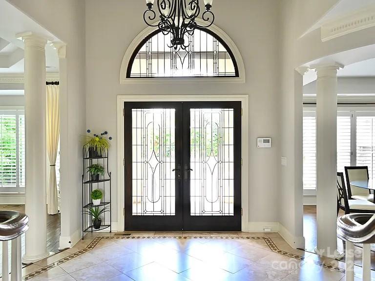 17234 Jetton Road Cornelius, NC 28031 - Photo 5 of 32 a view of a livingroom with wooden floor and a window