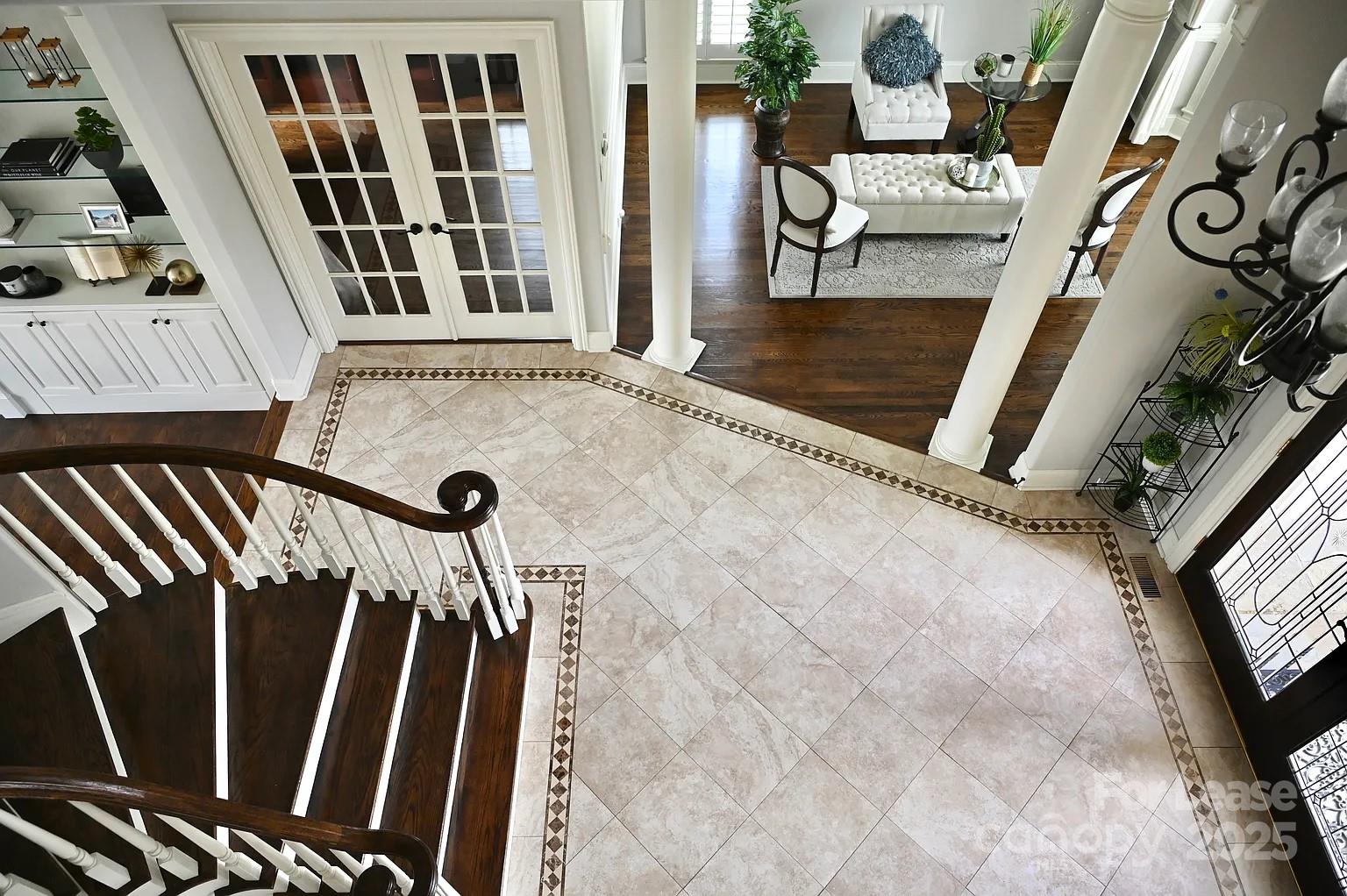 17234 Jetton Road Cornelius, NC 28031 - Photo 6 of 32 a view of an entryway with staircase