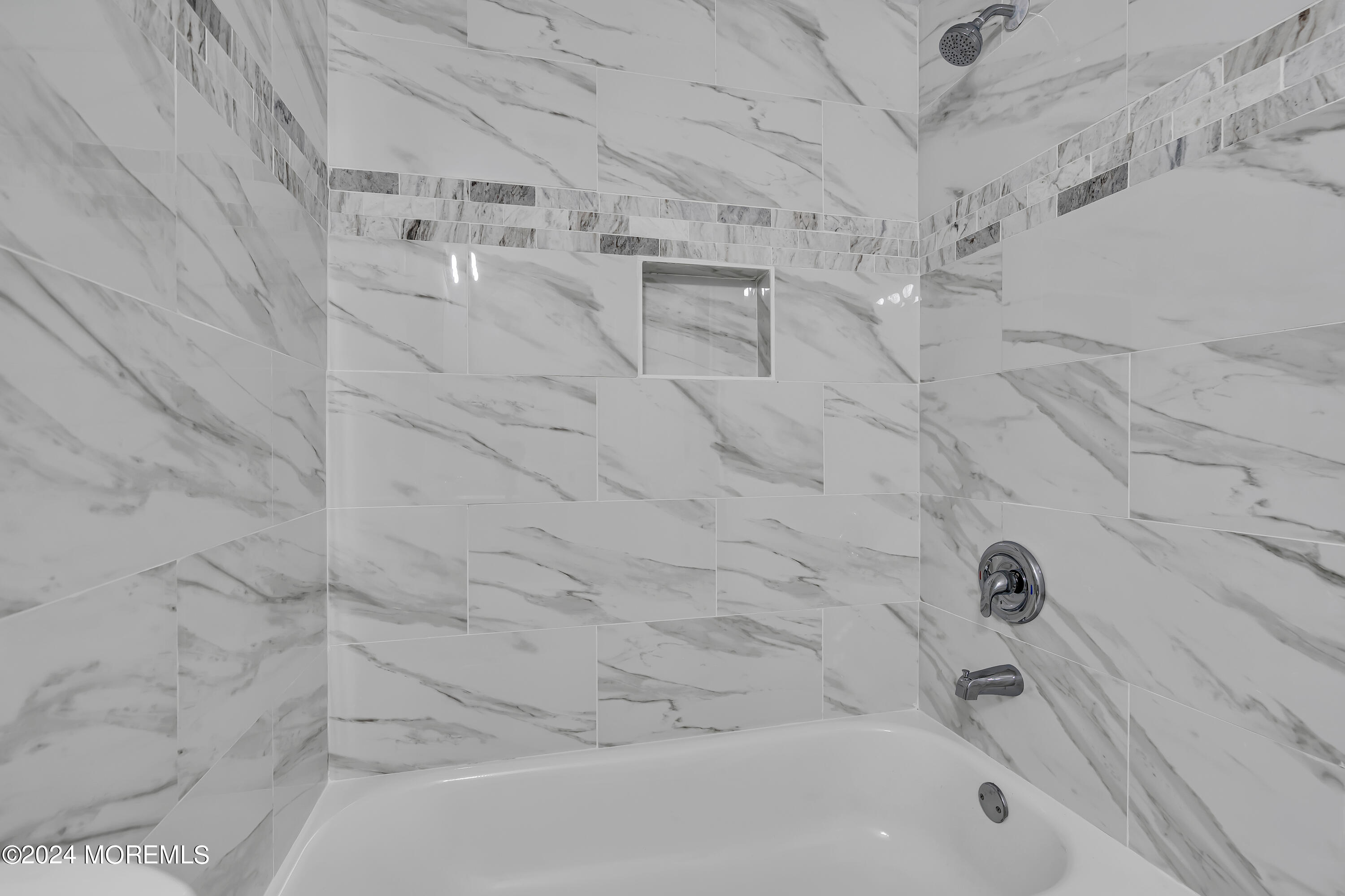 7 A Spring Street, Unit 50 Whiting, NJ 08759 - Photo 13 of 16 a bathroom with a bathtub