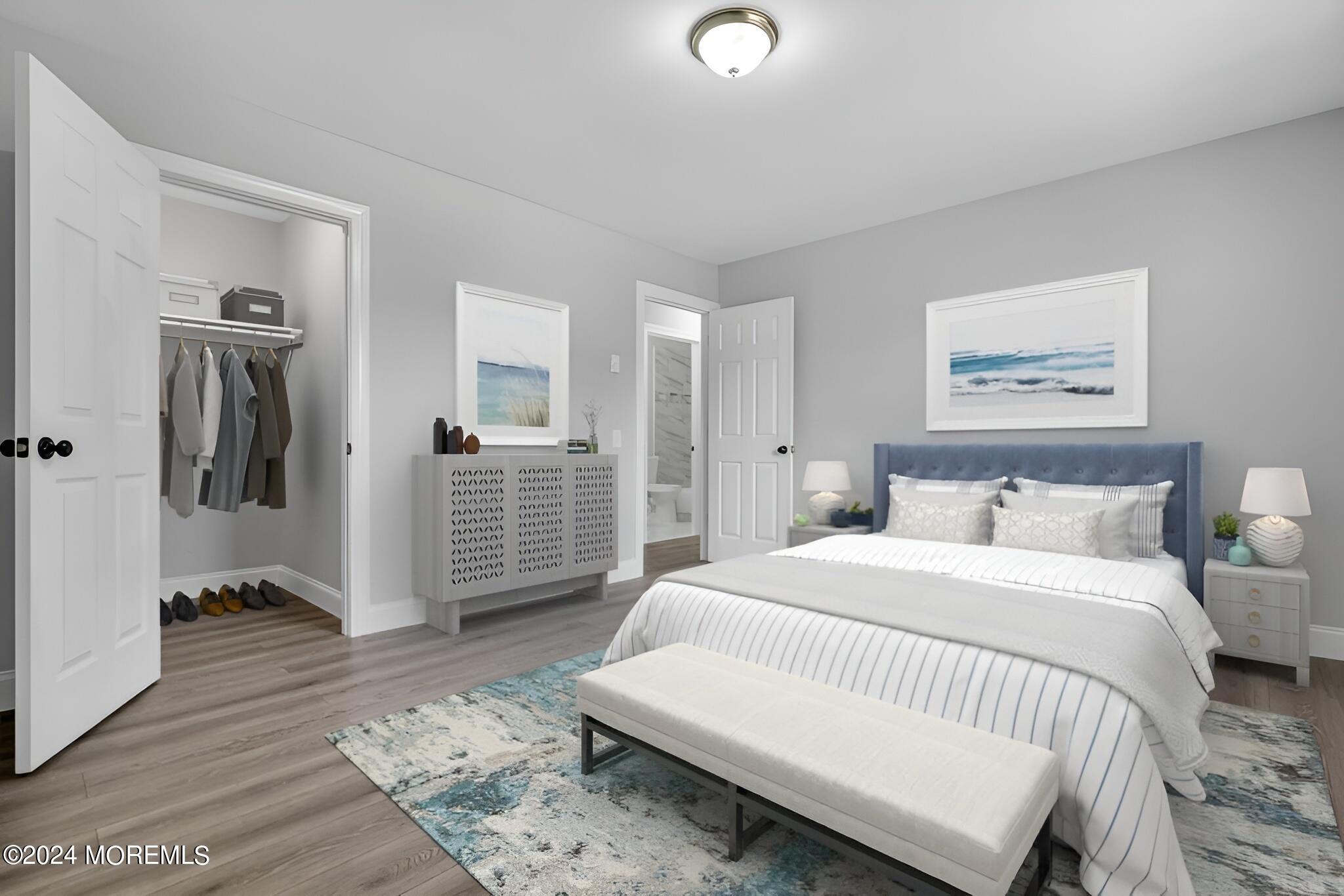 7 A Spring Street, Unit 50 Whiting, NJ 08759 - Photo 14 of 16 a bedroom with a large bed a rug and chair