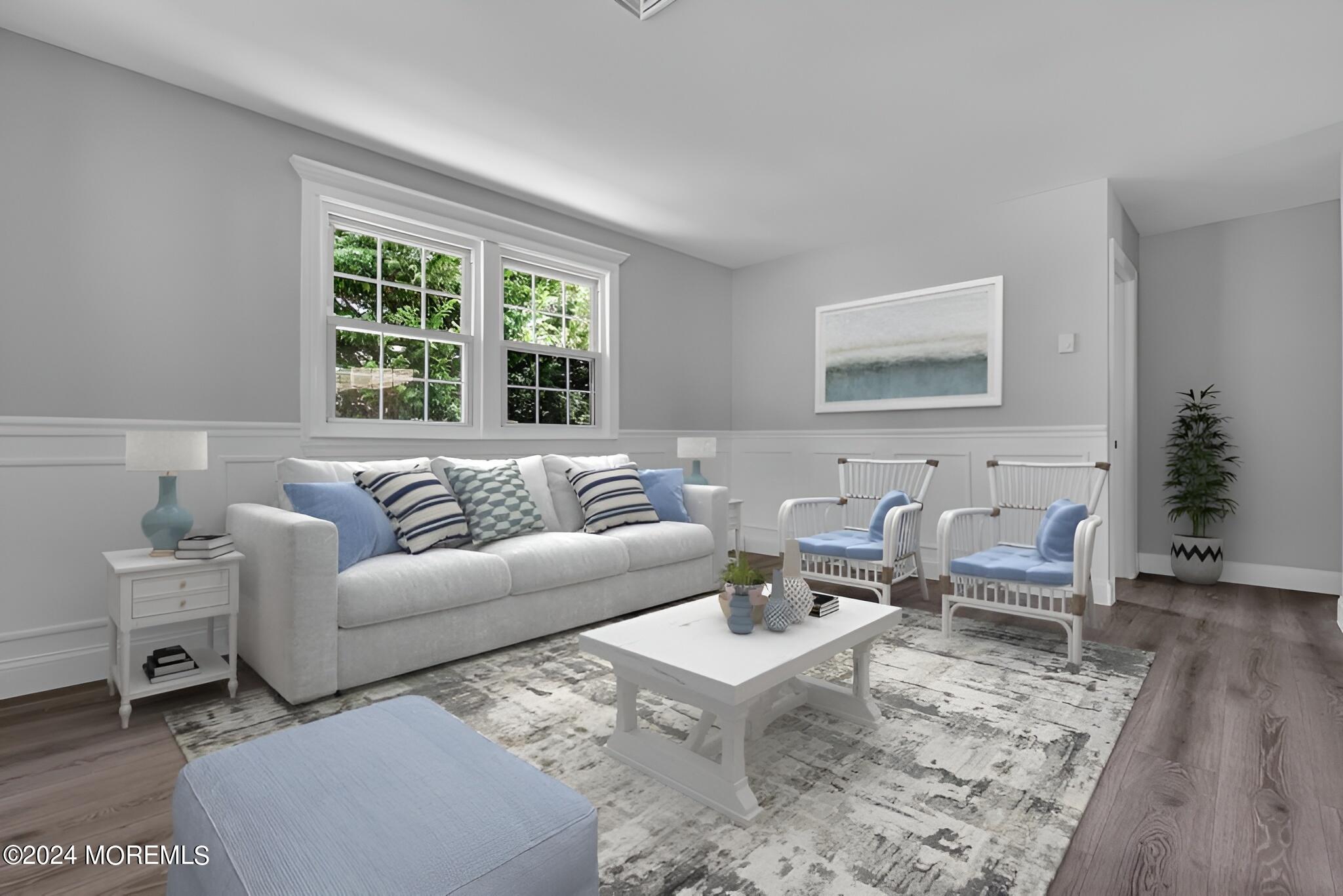 7 A Spring Street, Unit 50 Whiting, NJ 08759 - Photo 5 of 16 a living room with furniture and a large window