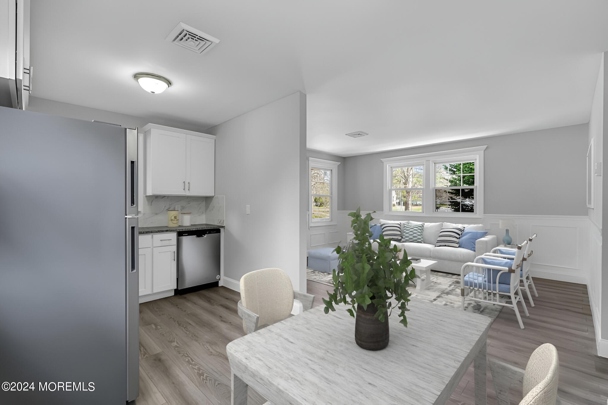 7 A Spring Street, Unit 50 Whiting, NJ 08759 - Photo 7 of 16 a kitchen with a table and chairs