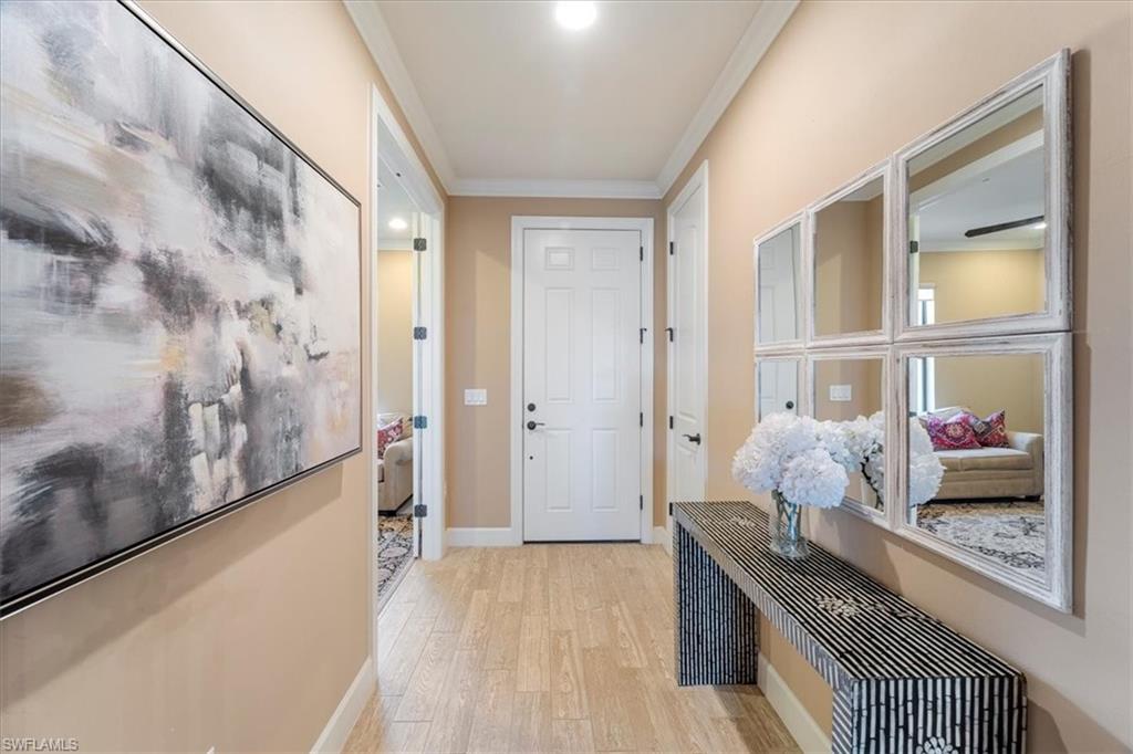 9418 Greyhawk Trail Naples, FL 34120 - Photo 2 of 34 a living room with furniture