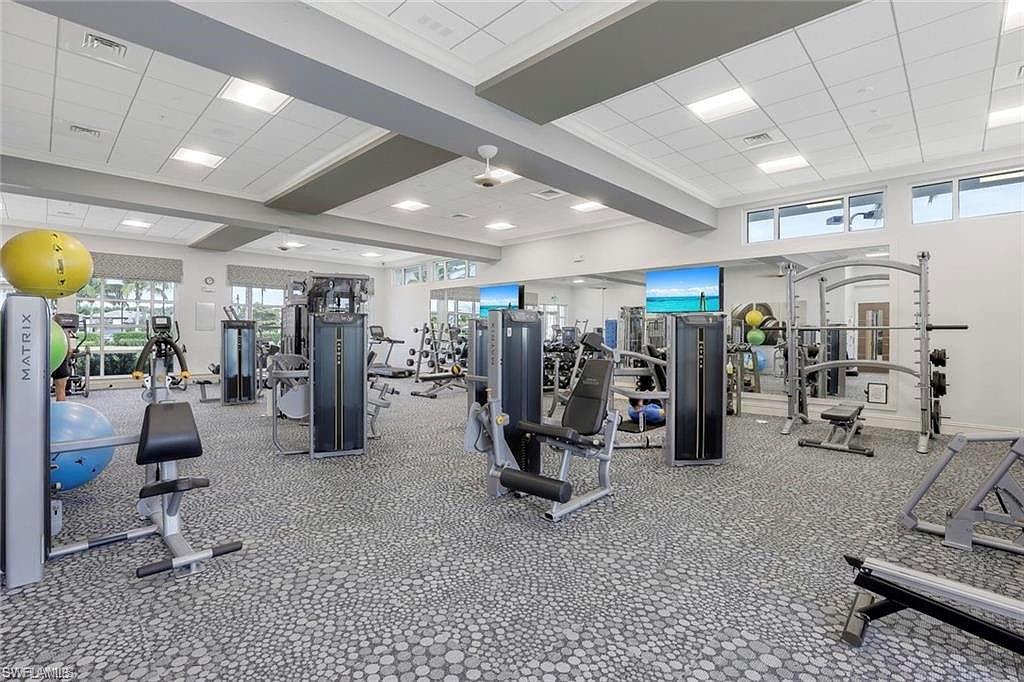9418 Greyhawk Trail Naples, FL 34120 - Photo 33 of 34 a view of a room with gym equipment