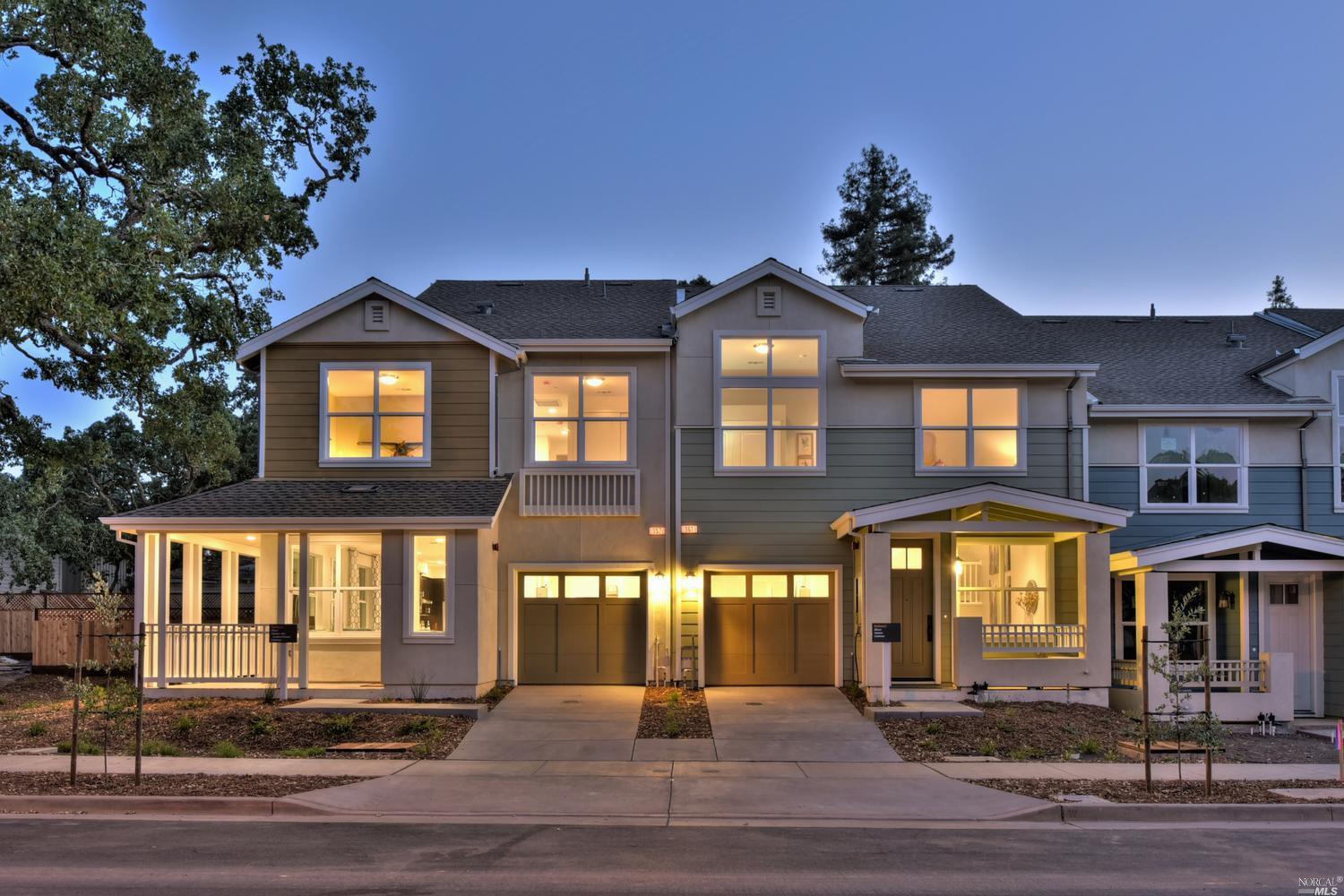 908 Prospect Avenue Santa Rosa, CA 95409 - Photo 1 of 1 a front view of a residential apartment building with a yard