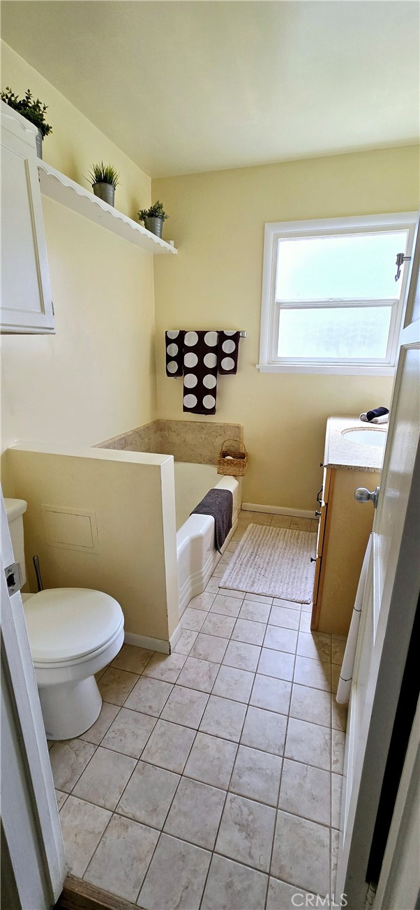 6455 Amigo Avenue Reseda, CA 91335 - Photo 6 of 18 Main Bathroom with Shower behind door