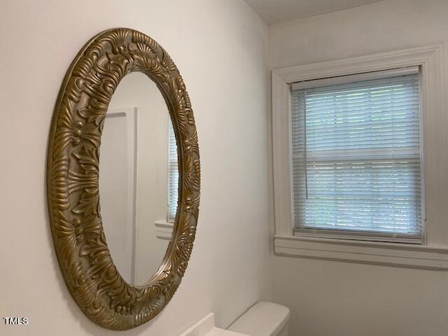9081 Virgilina Road Roxboro, NC 27574 - Photo 25 of 36 entering the bathroom is a beautiful vanity mirror