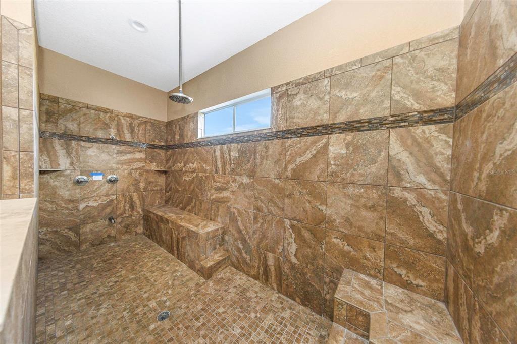 20138 Bowman Road Spring Hill, FL 34610 - Photo 35 of 40 a bathroom with a shower