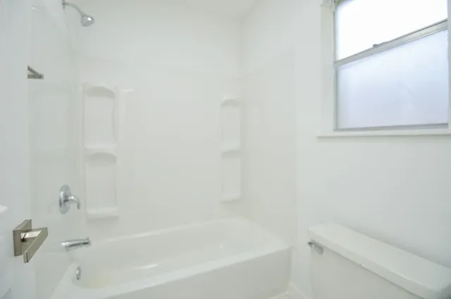 a bathroom with a bathtub