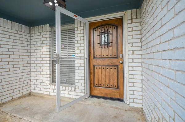 a view of front door with outdoor space