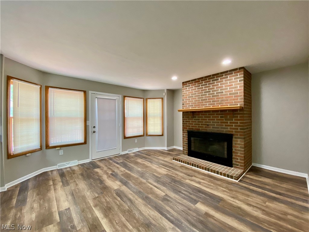 4407 Archer Road Cleveland, OH 44105 - Photo 7 of 34 Family room with wood-burning fireplace
