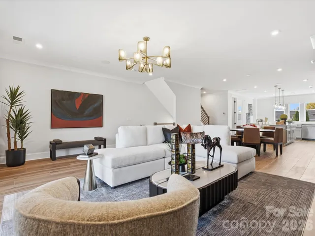 a view of kitchen with cabinets and wooden floor