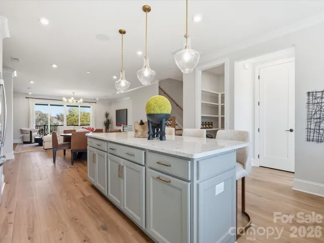 a work room with furniture and wooden floor