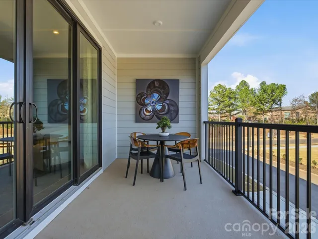 a view of a brick building with many windows