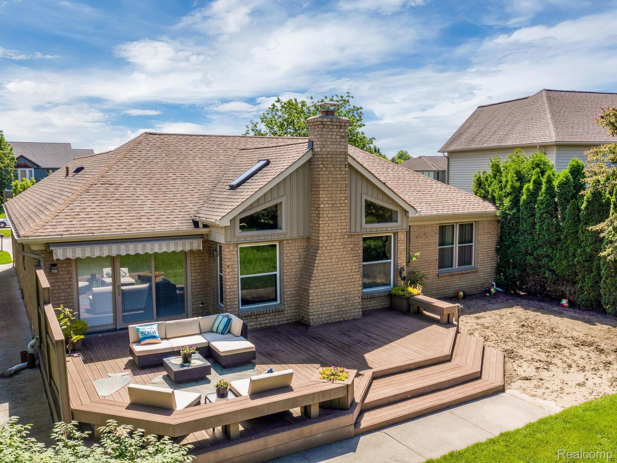 3072 Primrose Drive Rochester, MI 48307 - Photo 16 of 19 Back Patio With Sandy Beach