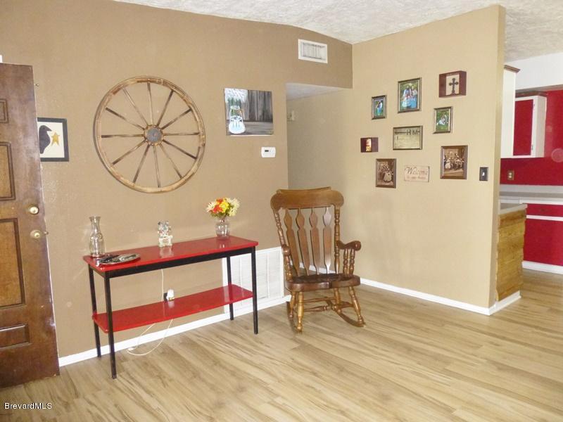 283 Lee Road Melbourne, FL 32904 - Photo 5 of 28 living room 2