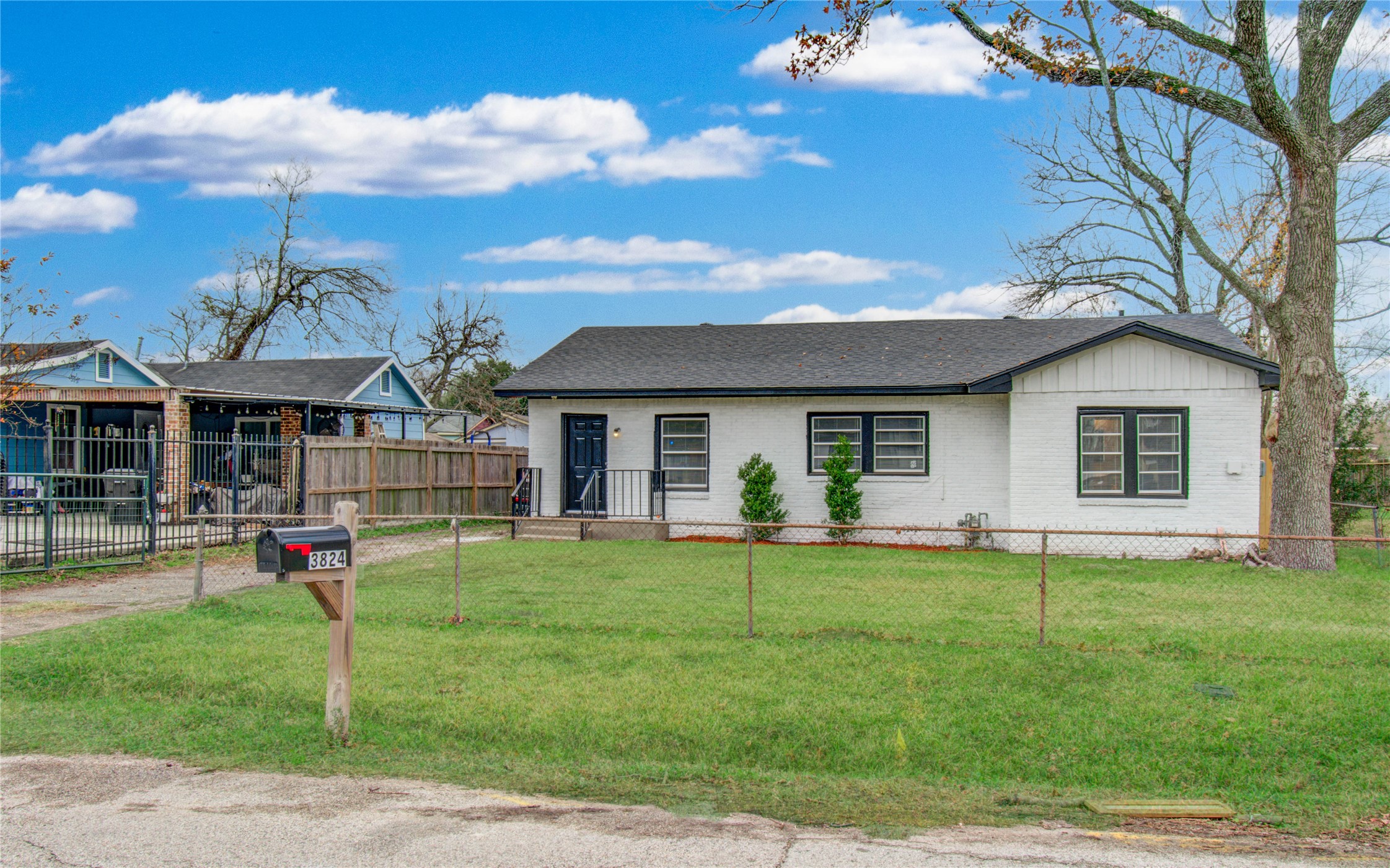 3824 Topping Street Houston, TX 77093 - Photo 2 of 31 a view of a house with a yard and sitting area