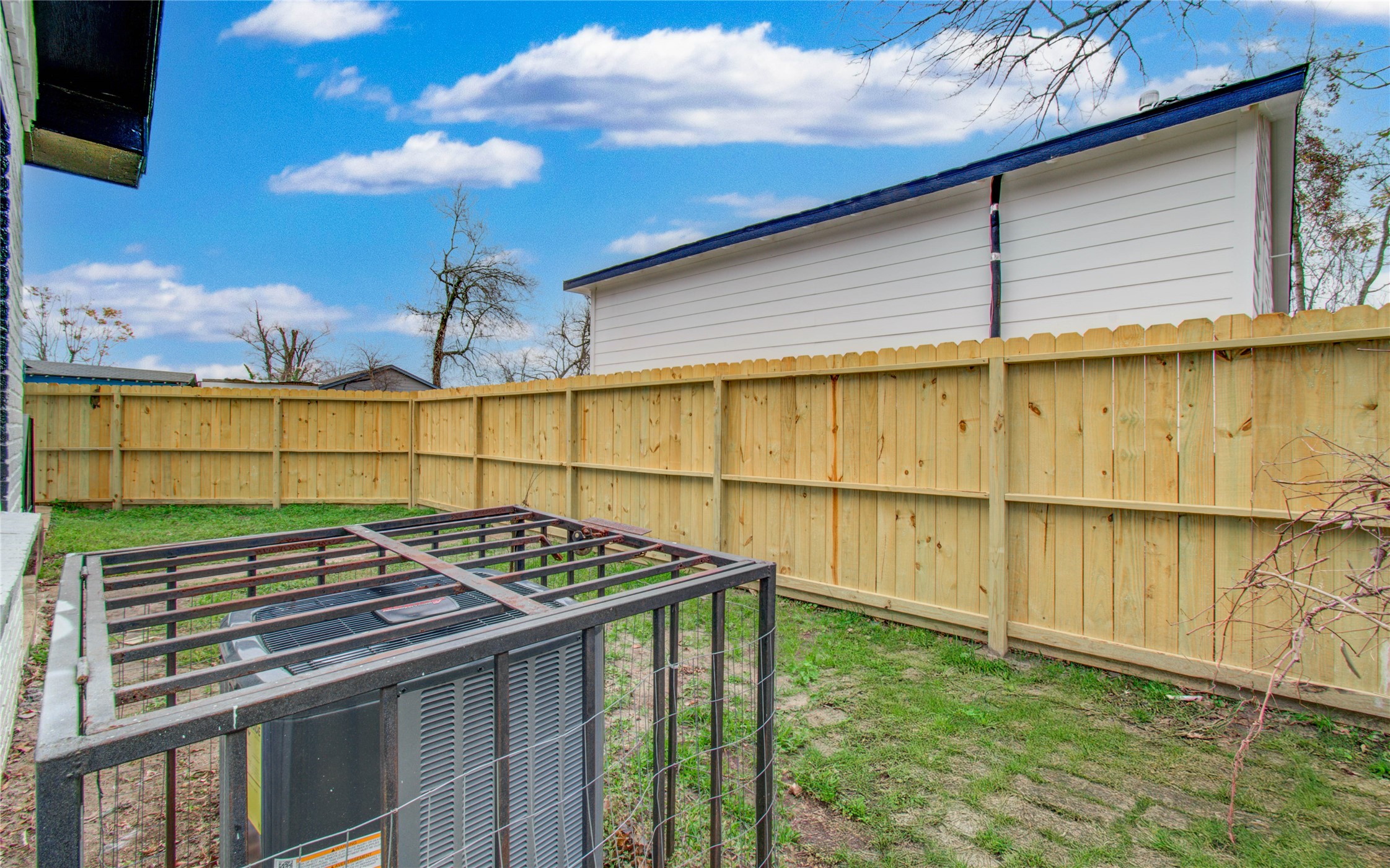 3824 Topping Street Houston, TX 77093 - Photo 30 of 31 a view of backyard with wooden fence