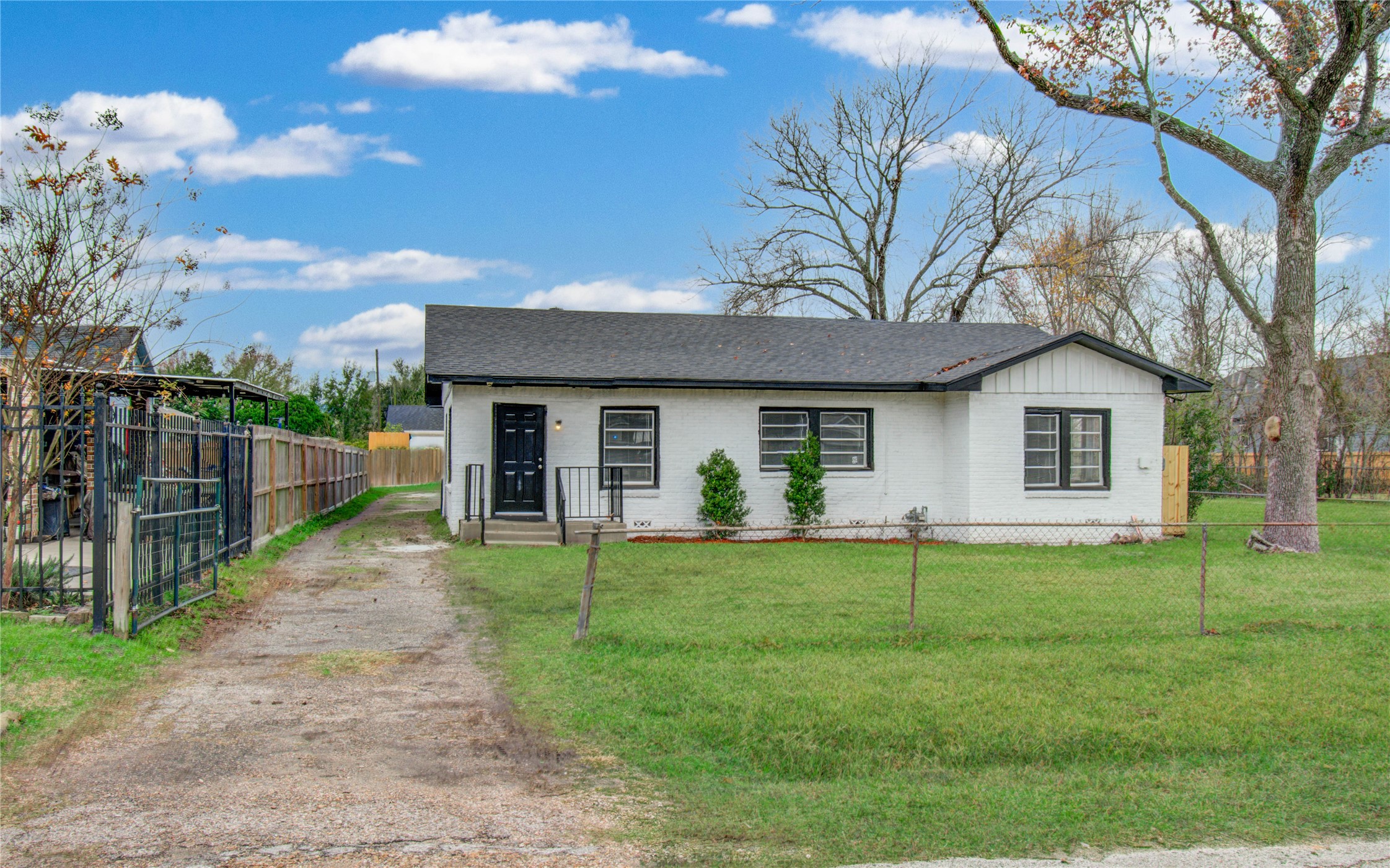 3824 Topping Street Houston, TX 77093 - Photo 3 of 31 a view of a house with a yard