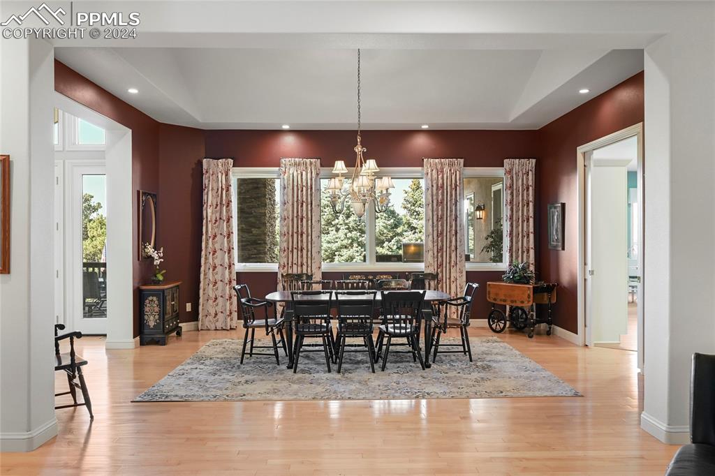 14595 Roller Coaster Road Colorado Springs, CO 80921 - Photo 8 of 50 a view of a dining room with furniture window and outside view
