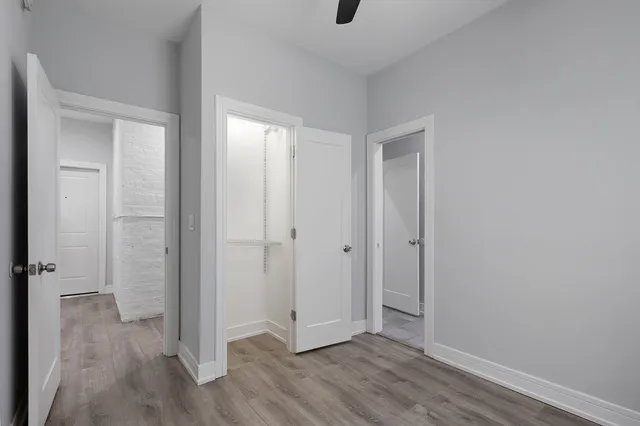 a view of a livingroom with wooden floor
